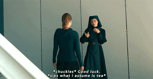 two women standing next to each other with one saying " chuckles "