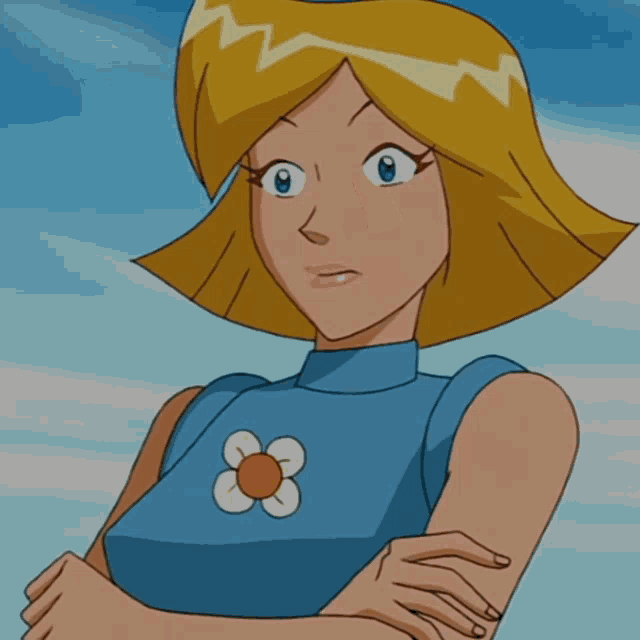 a cartoon girl with blonde hair and a blue shirt is making a funny face