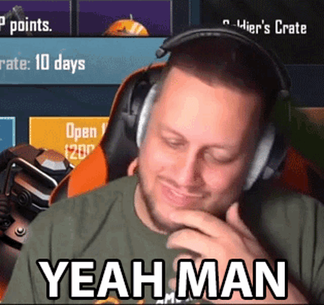 a man wearing headphones says " yeah man " in front of him