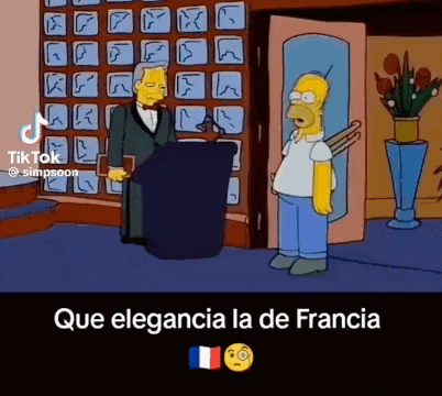 homer simpson is standing in front of a podium with a man in a tuxedo giving a speech .