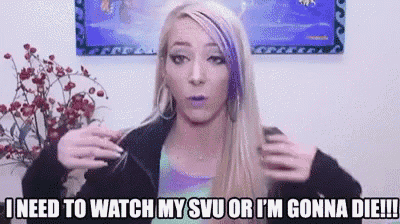 a woman with purple hair is holding her hair and saying i need to watch my svu or i 'm gonna die .
