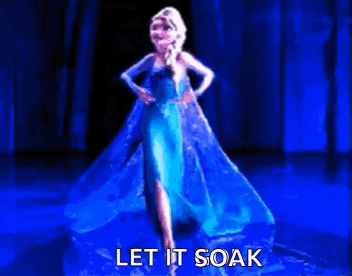 elsa from frozen is dancing in the water with the words let it soak above her
