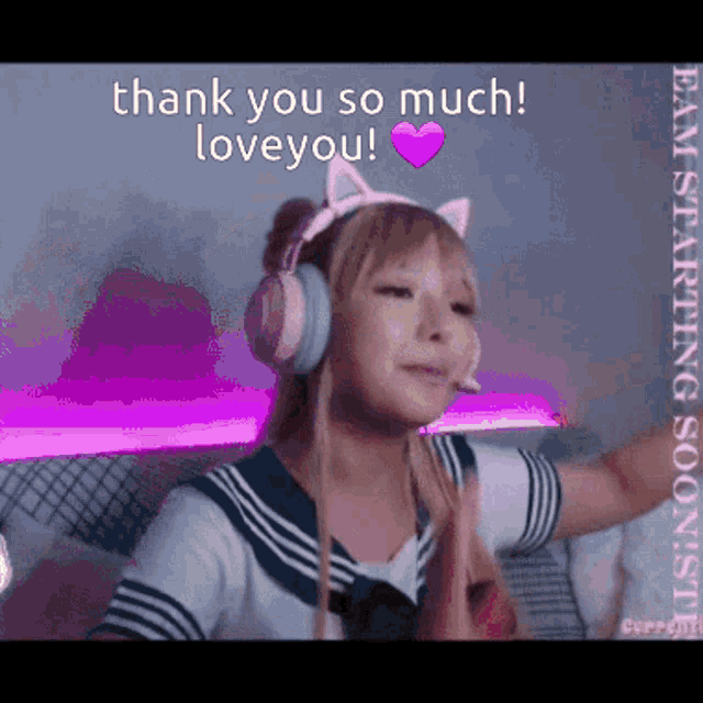a girl wearing headphones and a cat headband says thank you so much love you