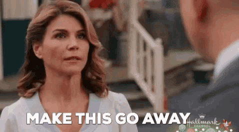 a woman is talking to a man in front of a house and saying `` make this go away '' .