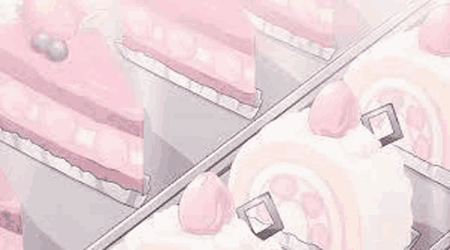 a bunch of pink cakes are sitting in a tray .