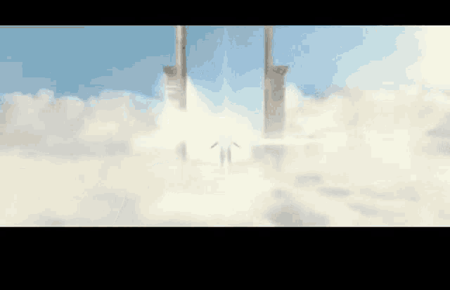 a rocket is being launched into the sky with a blue sky in the background .