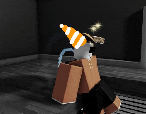 a person wearing an orange and white party hat