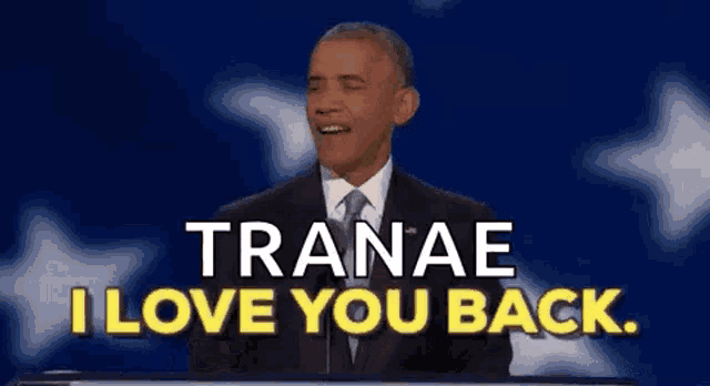 barack obama is giving a speech and says i love you back .