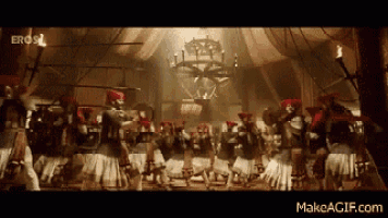 a group of people are dancing in a room with eros written on the bottom of the screen