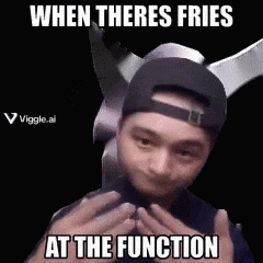 a man wearing a baseball cap is making a funny face and says when theres fries at the function