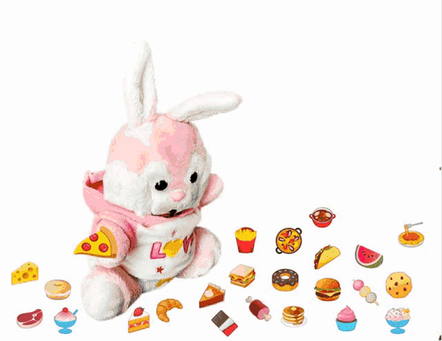 a stuffed bunny with a speech bubble that says " food "