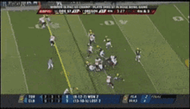 a football game is being played on espn 's broadcast screen