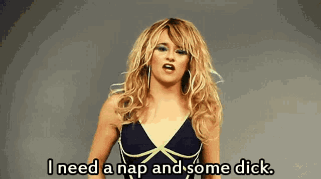 a woman in a wig is saying i need a nap and some dick