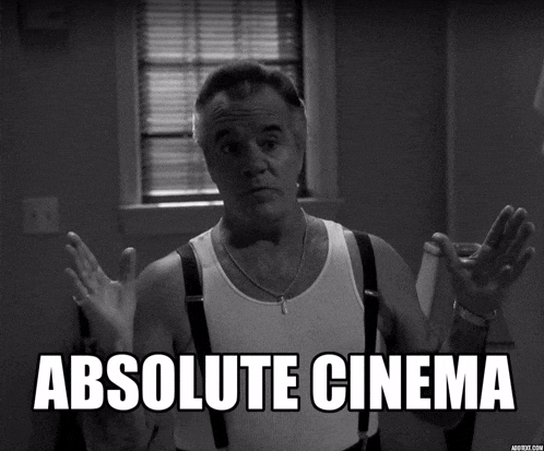 a black and white photo of a man with the words absolute cinema