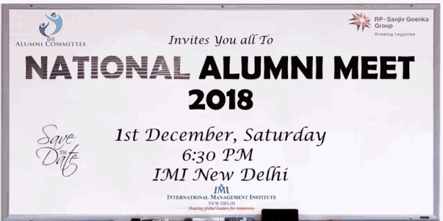 a white board that says national alumni meet on it