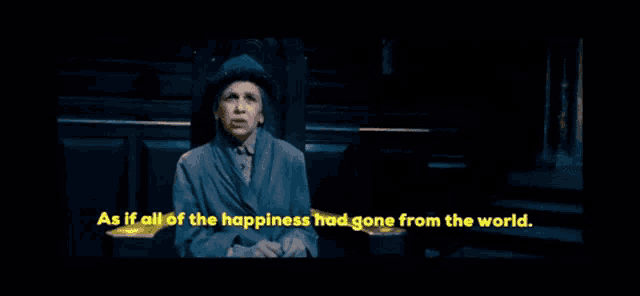 a woman in a robe and hat says " as if all of the happiness had gone from the world .. "