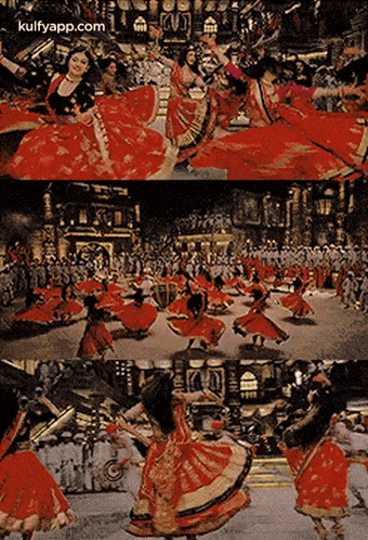 a group of women in red dresses are dancing on a stage .