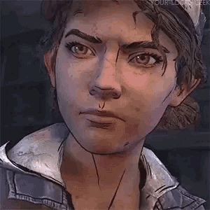 a close up of a woman 's face with a serious look on her face in a video game .