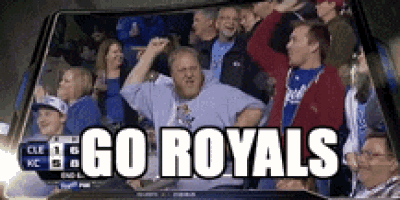 a group of people watching a baseball game with the words go royals on the bottom