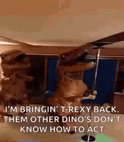 a t-rexy dinosaur is standing on a pole in a living room .