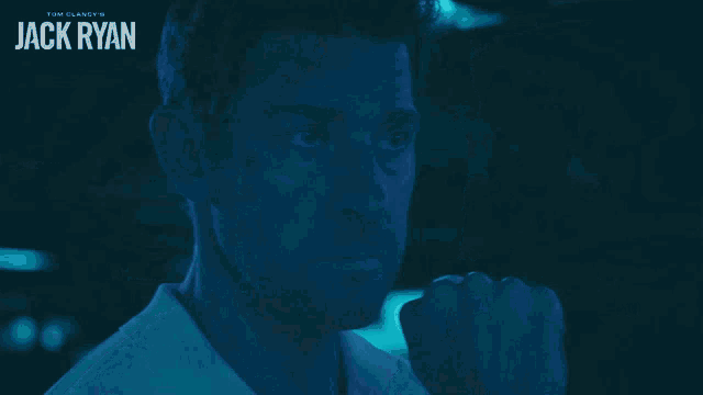 a poster for the movie jack ryan shows a man 's face