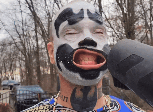 a man with a tattoo on his neck that says ' n '