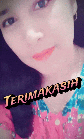 a close up of a woman 's face with the words terima kasih on the bottom right