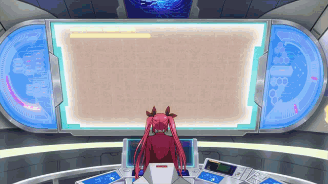a girl with red hair is sitting in front of a computer screen