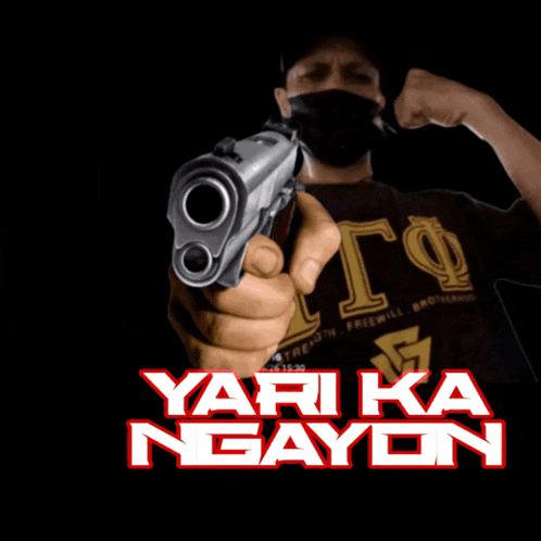 a man holding a gun with the words yari ka ngayon in white