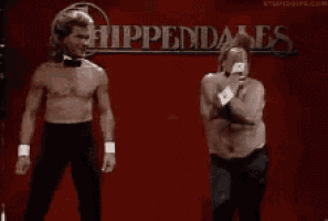 two men are dancing in front of a sign that says hippendales
