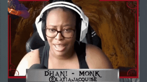 a woman wearing headphones and glasses with the name dhani monk