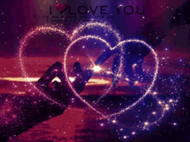 two hands making a heart with the words i love you behind them