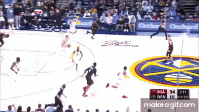 a basketball game is being played on a court with a logo for bud light arena