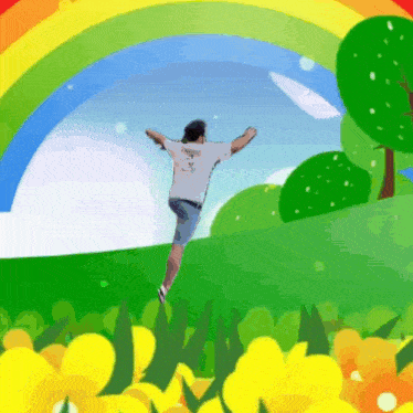 a man is jumping in the air with a rainbow behind him