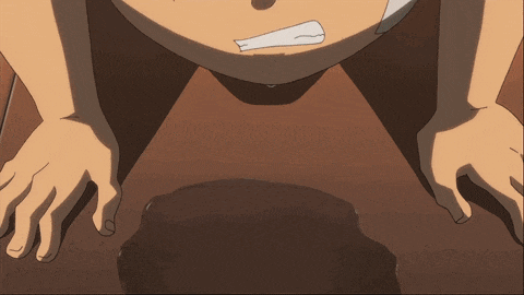 a close up of a cartoon character 's face with a bandage on his head