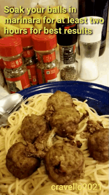 a plate of spaghetti and meatballs with a caption that says soak your balls in marinara