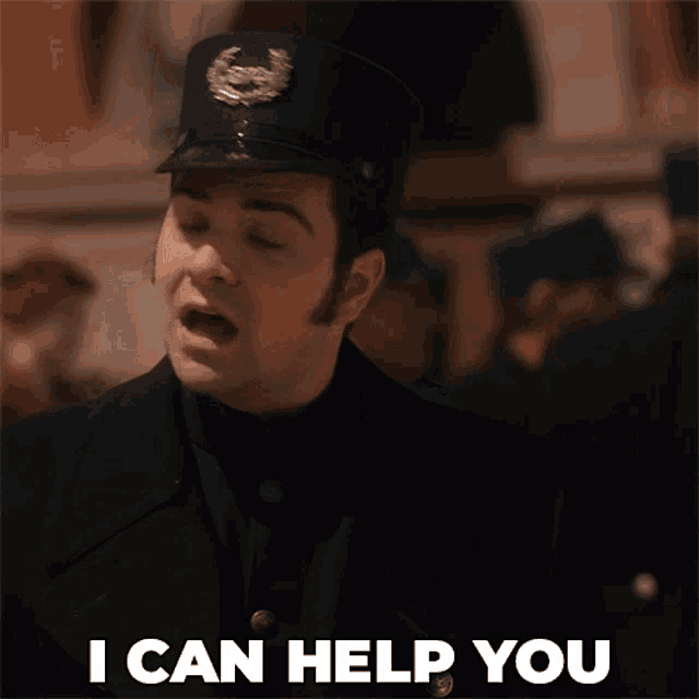 a man wearing a police hat says i can help you