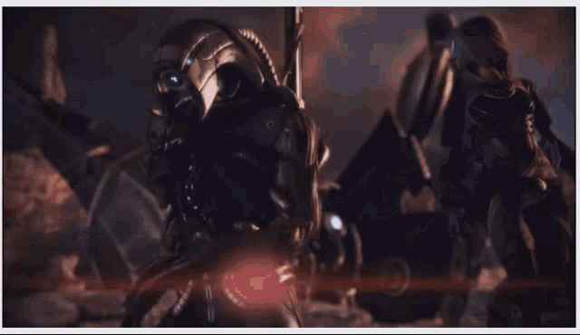 a video game character is being attacked by a robot with a blue light coming out of his eyes .