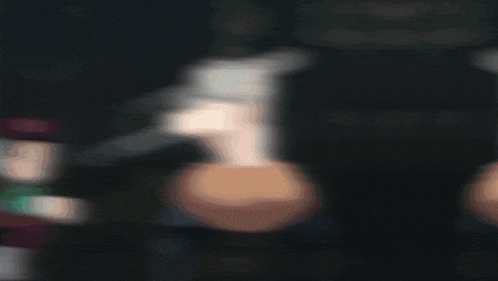 a pixelated image of a person swimming in a dark pool