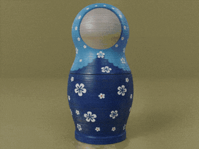 a blue green and orange russian nesting doll with white flowers on them