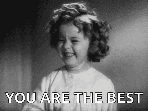 a little girl is smiling in a black and white photo and saying `` you are the best '' .