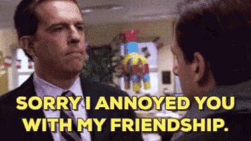 a man in a suit and tie is talking to another man and says sorry i annoyed you with my friendship .