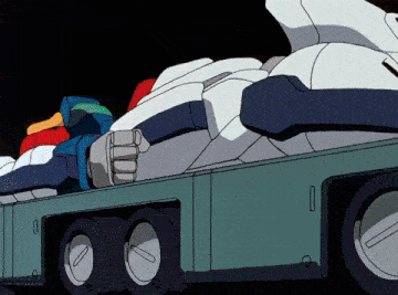 a robot is sitting on the back of a truck with a black background