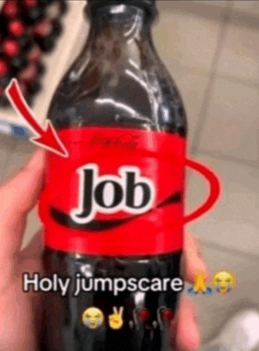 a person is holding a bottle of coke with a red label that says job on it .