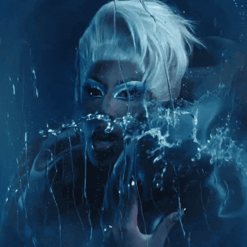 a painting of a woman behind a blue glass with water coming out of her mouth