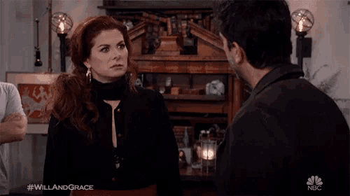 a man and a woman are looking at each other with the hashtag #willandgrace on the bottom