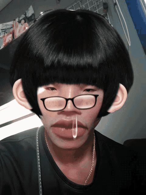 a man wearing glasses and a fake mustache has a tear coming out of his mouth