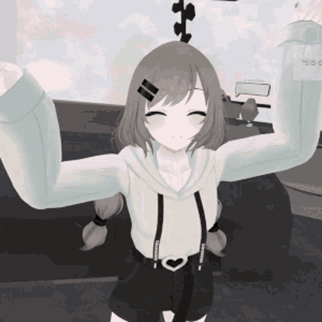 a girl in a white hoodie and black shorts with a heart on her belt