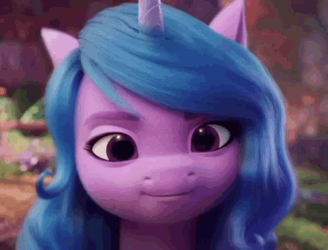 a close up of a purple pony with blue hair and a unicorn horn .