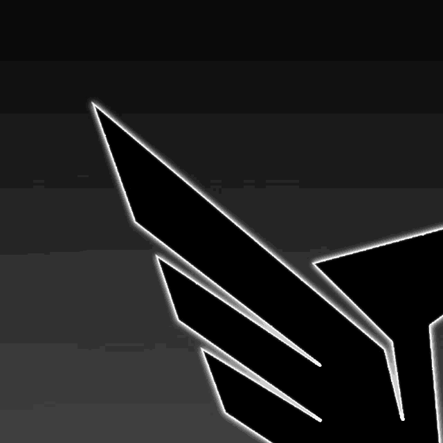 a close up of a black and white logo on a dark background